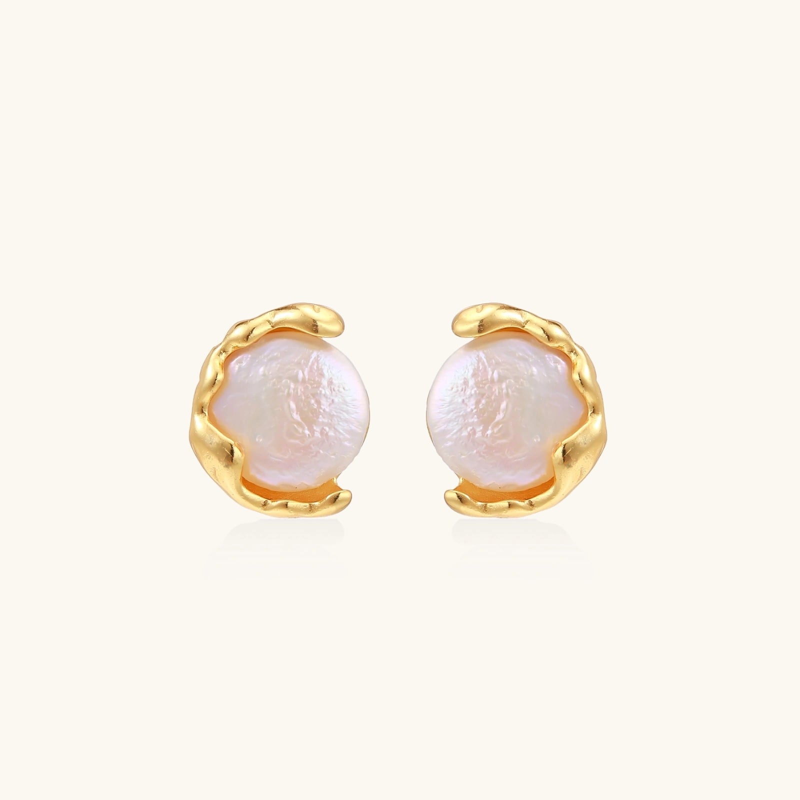 Gold vermeil studs with lustrous pink freshwater pearls in organic crescent settings